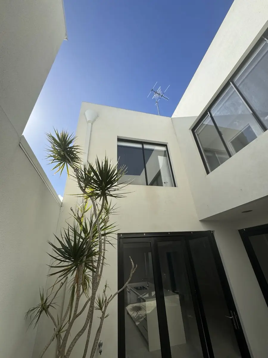 A soft-washed render wall in Perth, clean and ready to protect
