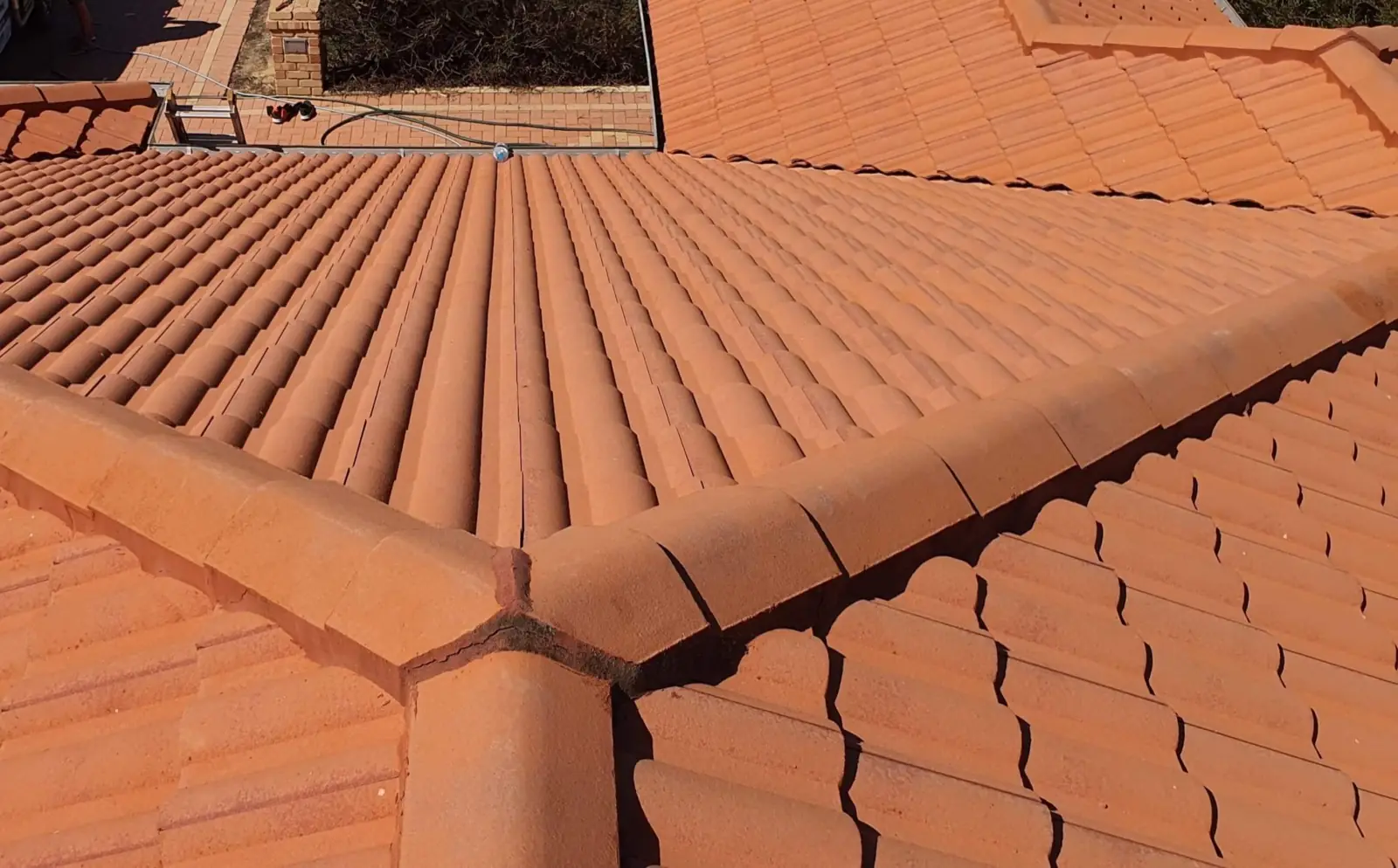 Clean terracotta tile roof in Perth after an Extera soft wash roof treatment