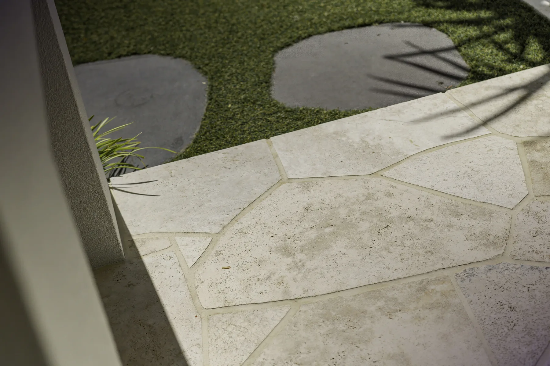 Sealed natural stone pavers